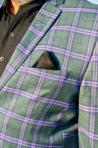 Green and purple plaid jacket with a pocket square