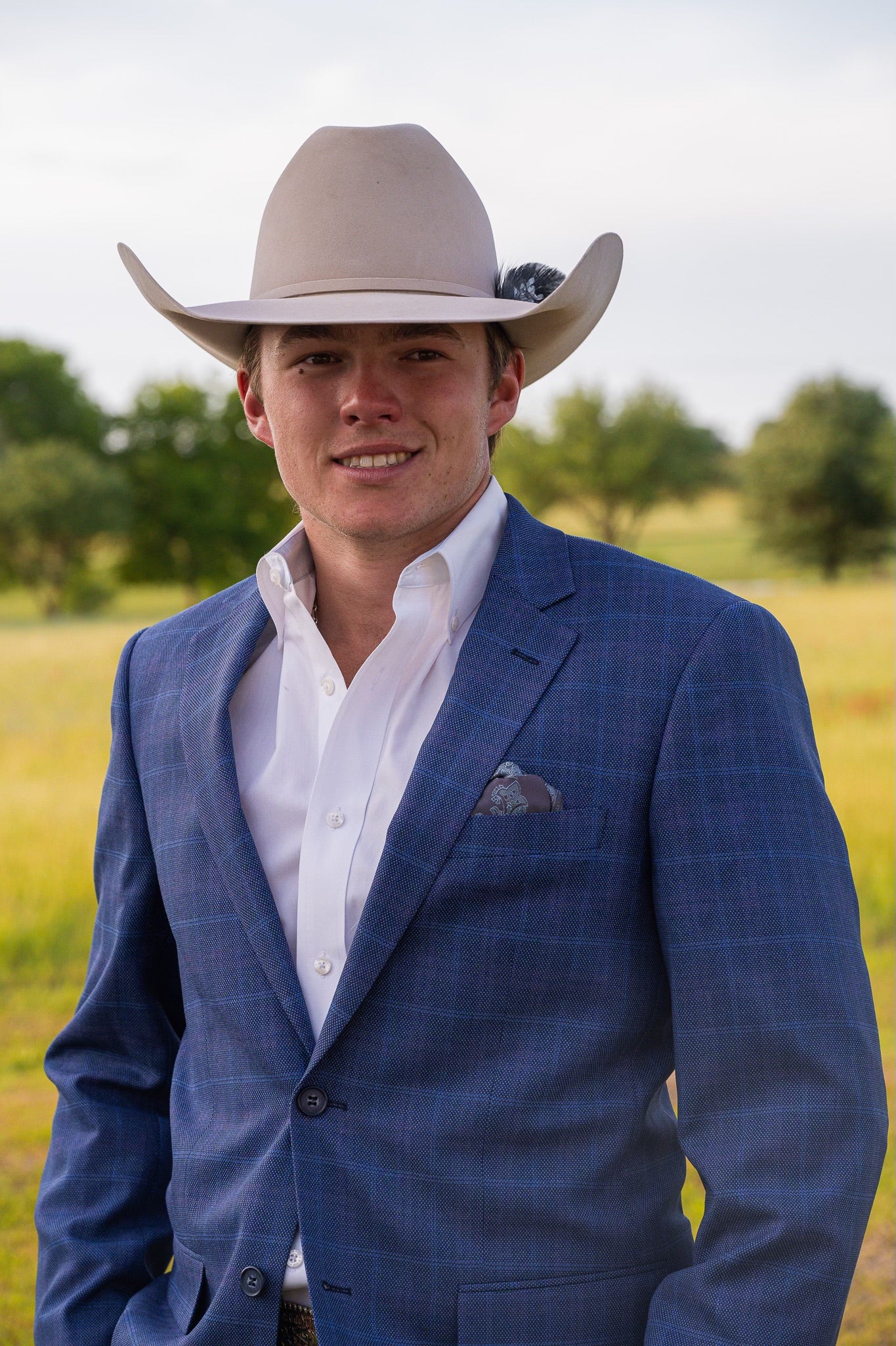 Western sport coat in ranch blue with pink plaid pattern and tailored cut